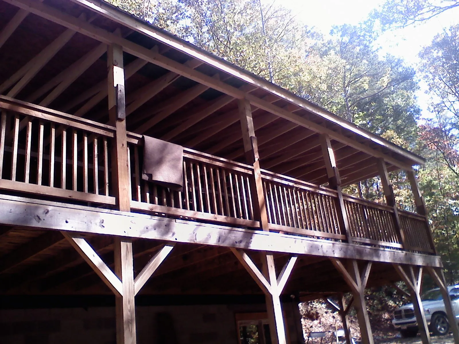Timber framing under a new elevated porch and deck — Roof Leak Repair in Maury by Roofing Brothers